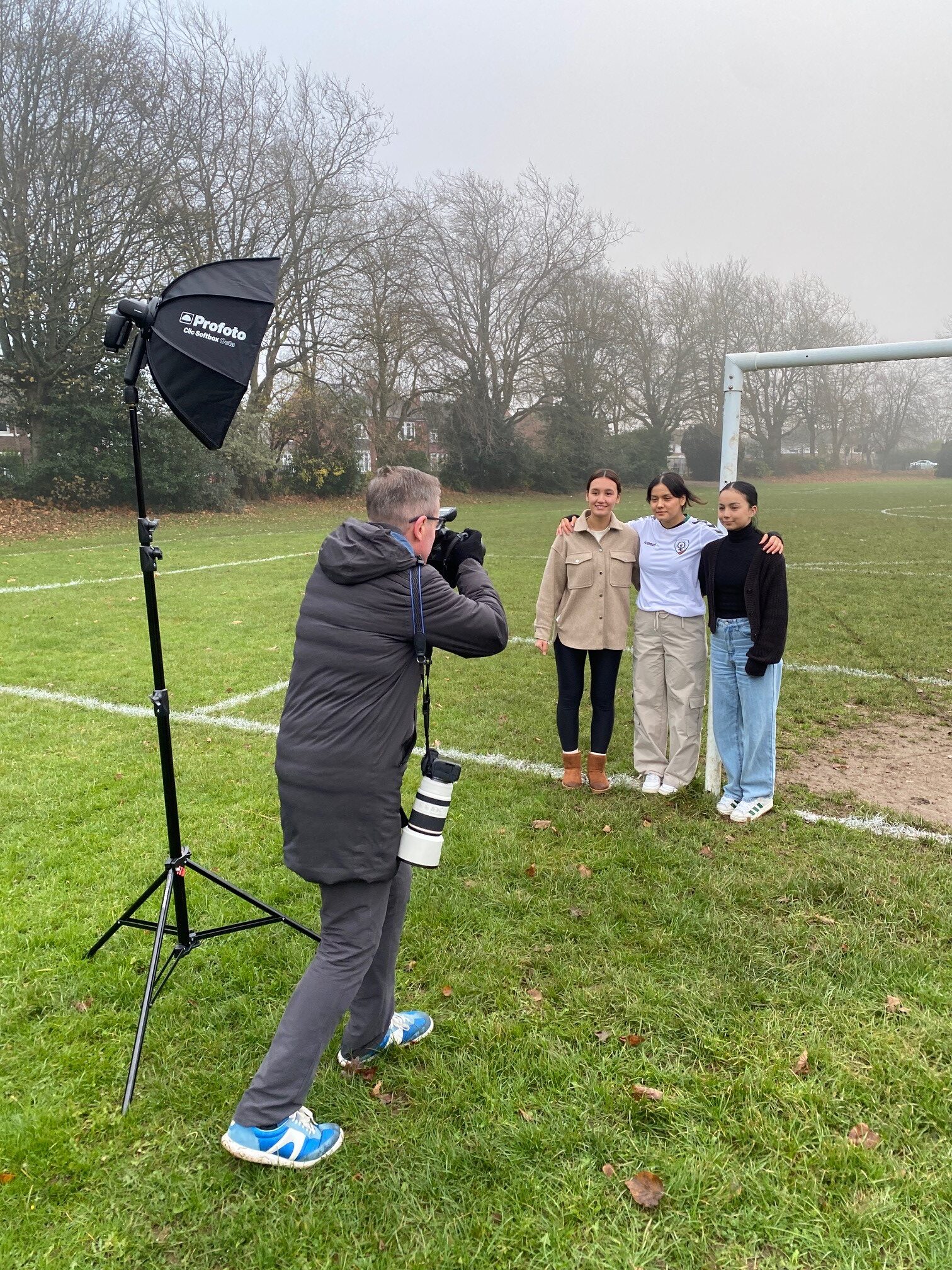 Narges, Najma and Elaha, being photographed by Chris.